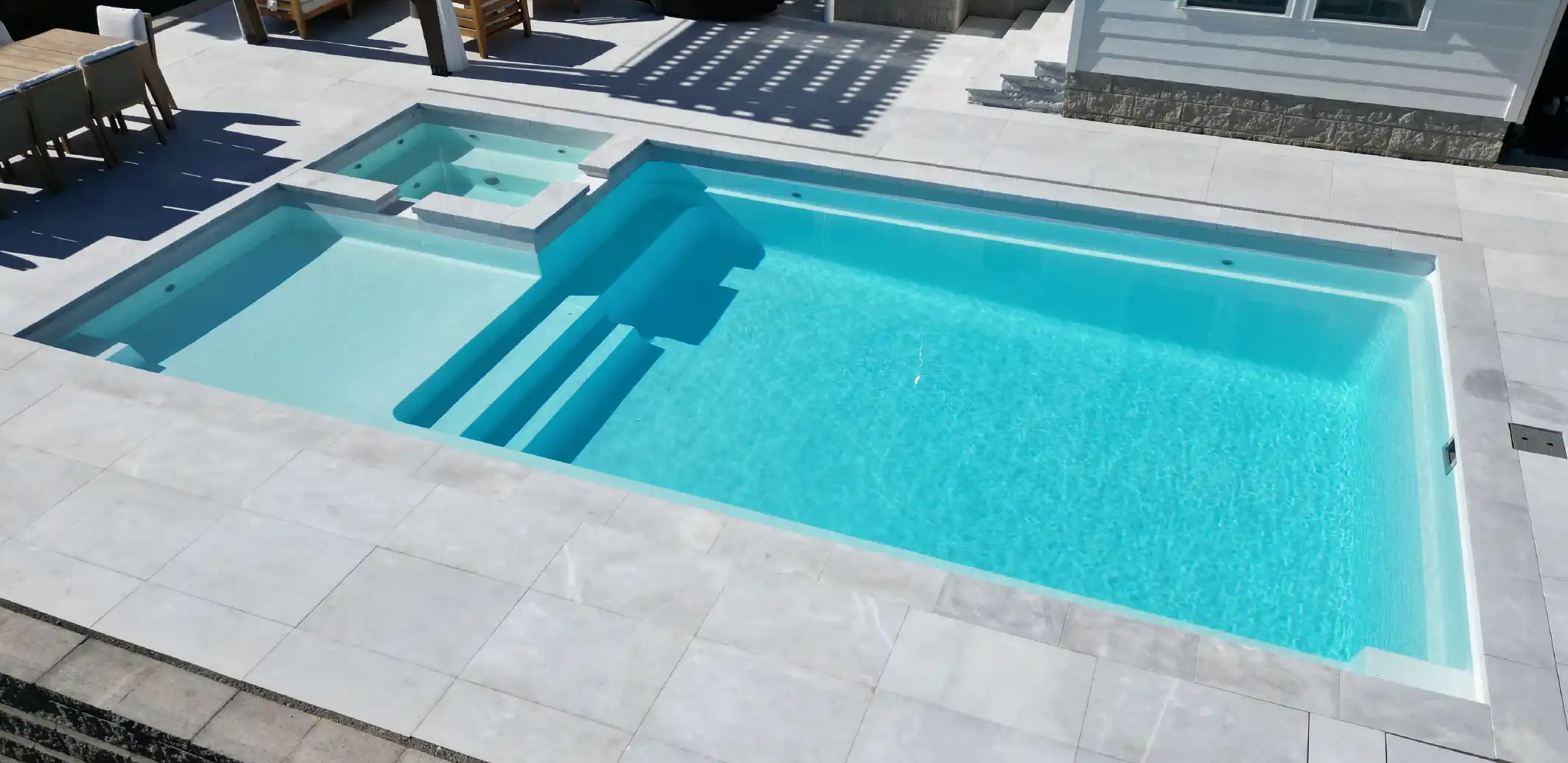 Key Features of the Intrigue backyard fiberglass pool