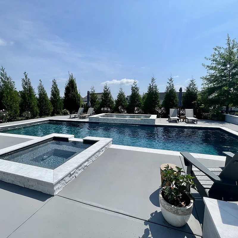 Aviva fiberglass pool and raised spa installation in Nashville