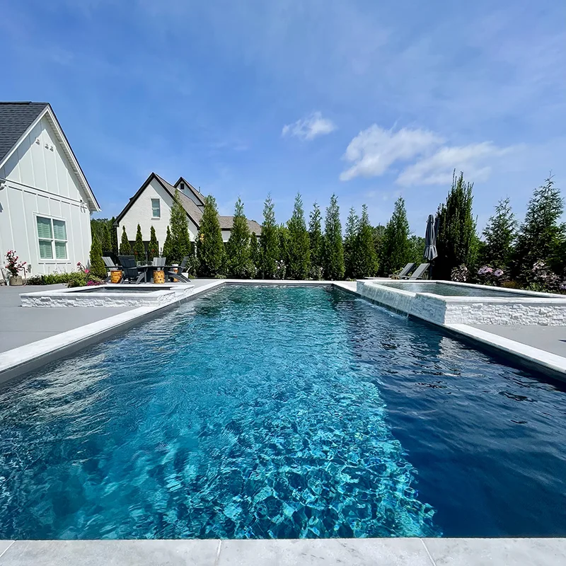 Aviva fiberglass pool installation with raised spa in Nashville