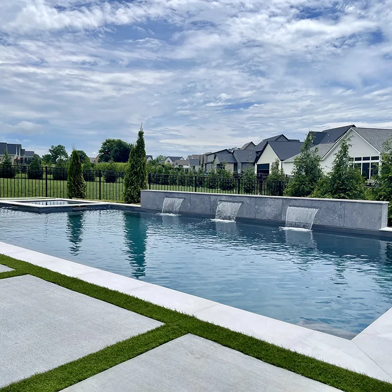 Aviva fiberglass pool installation with water features in Nashville